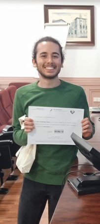 Assier collecting his diploma
